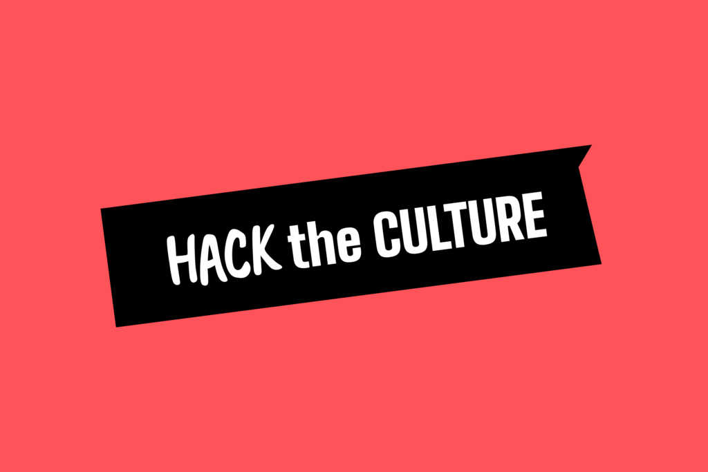 Bíle psané logo Hack the Culture v černém rámu na červeném pozadí.